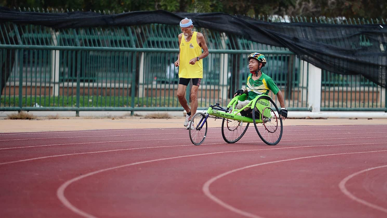Men with disabilities running on race track